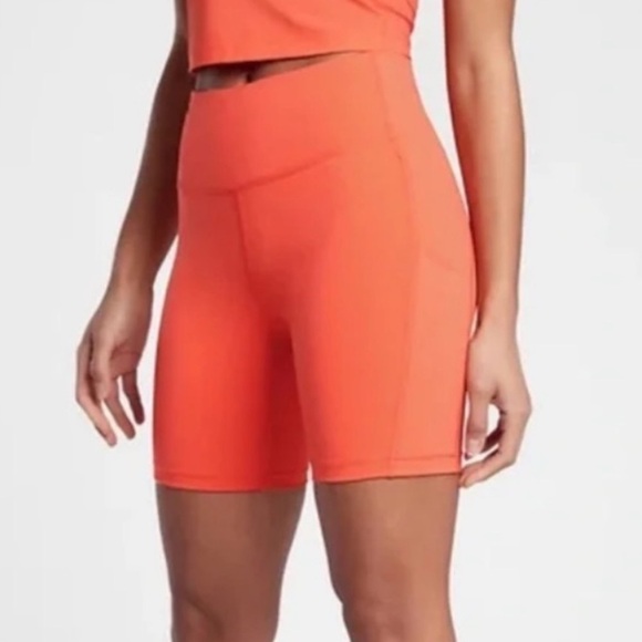 Athleta Pants - Athleta Coral Orange Ultimate Stash Pocket 7Shorts Size XS